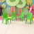 Flash Furniture 4-YU-YCX4-011-GREEN-GG Green Plastic Stackable School Chair with Carry Handle and 11