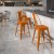 Flash Furniture ET-3534-24-OR-GG 24" Distressed Orange Metal Indoor/Outdoor Counter Height Stool with Back addl-1