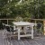 Flash Furniture TLH-017W-BK-GG Metal Indoor/Outdoor Restaurant Stack Chair with Triple Slat Black Faux Teak Back addl-4