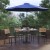 Flash Furniture XU-DG-304860364-UB19BNV-GG 30" x 48" Faux Teak Patio Table, Navy Umbrella & Base & 4 Stacking Faux Teak Chairs, 7 Piece Set addl-1
