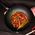 Winco J22-0030 Non-Stick Black Carbon Steel Stir Fry Pan with Phenolic Handle, 12" addl-5