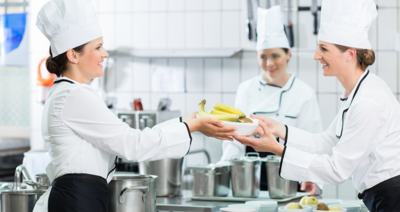 Kitchen staff preparing food