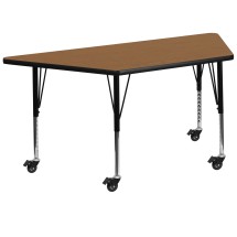 Flash Furniture XU-A3060-TRAP-OAK-T-P-CAS-GG Mobile 29''W x 57''L Trapezoid Oak Laminate Height Adjustable Activity Table, Short Legs